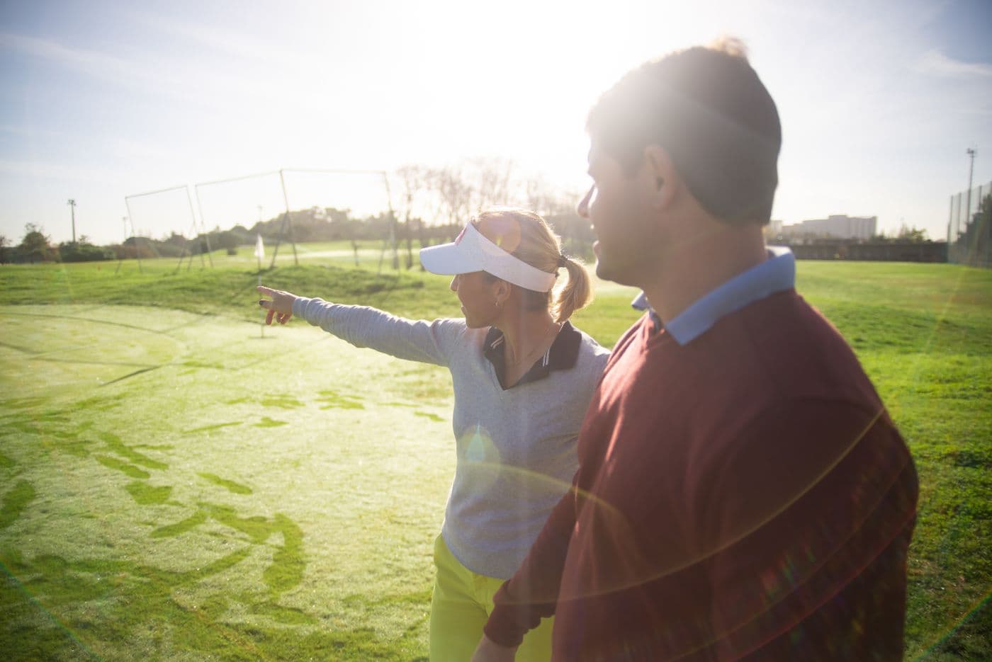 PGA professional giving a golf lesson